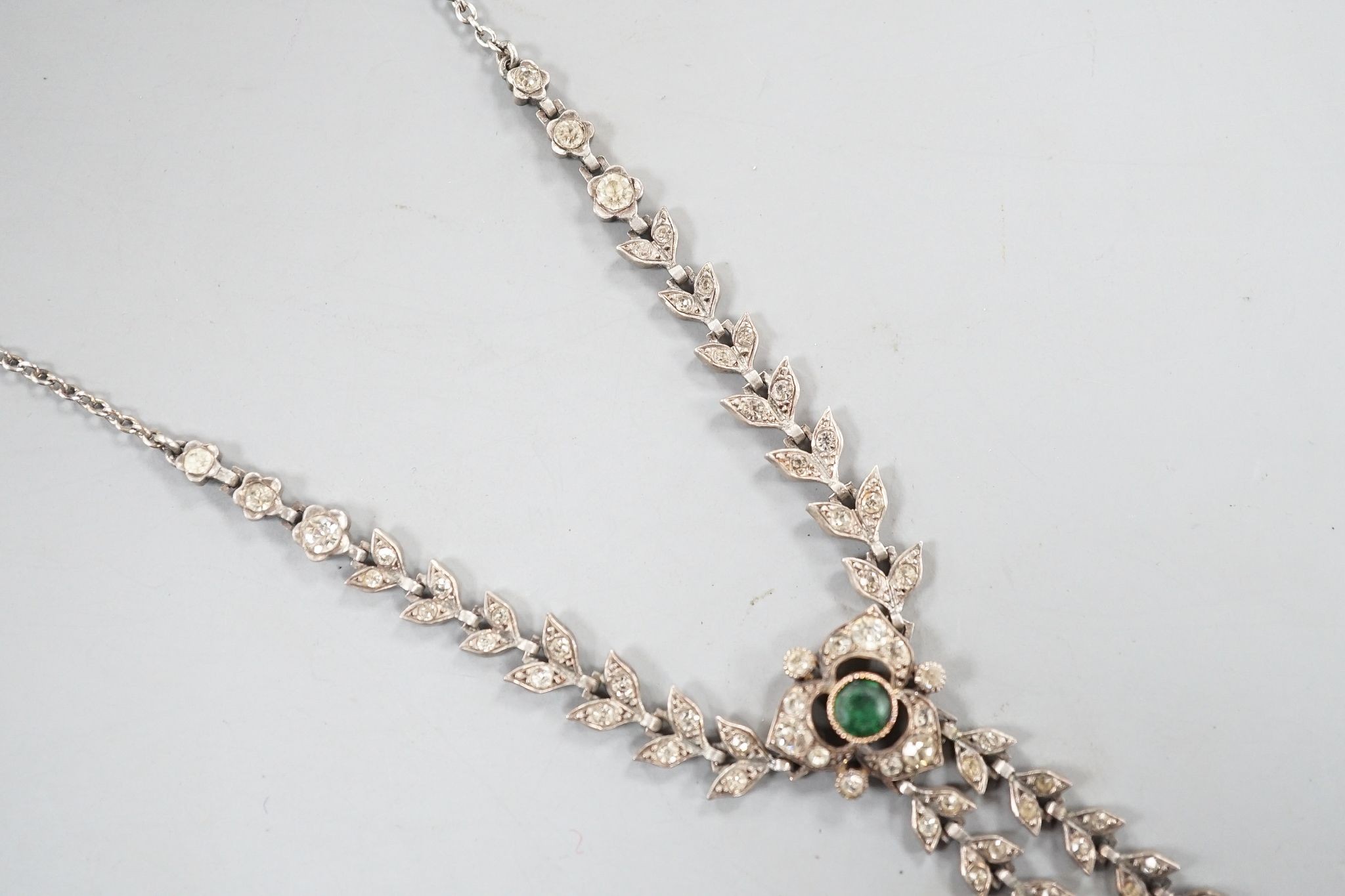 An antique white metal, two colour paste and simulated pearl set drop pendant necklace, 47cm.